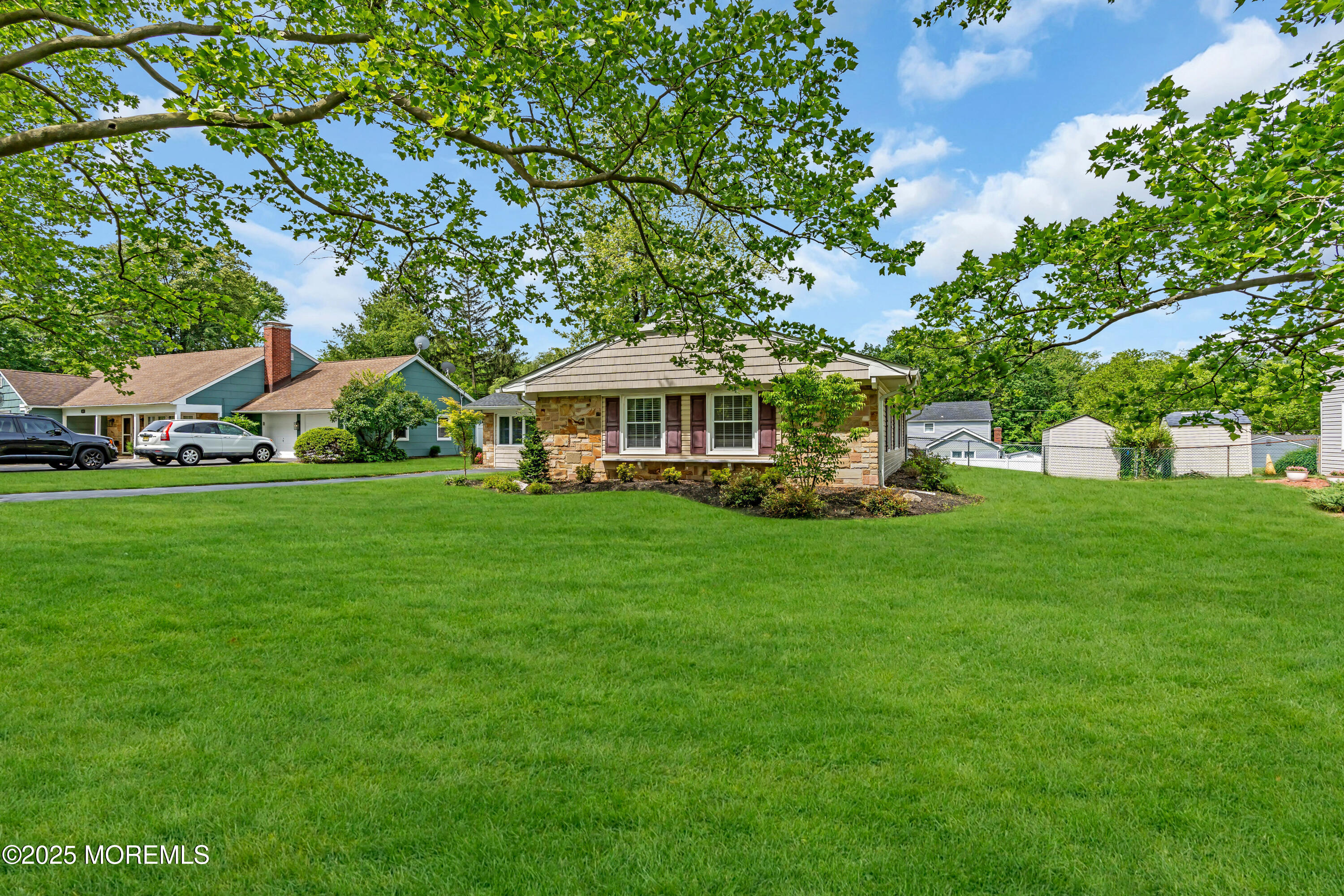 511 Line Road Aberdeen, NJ 07747 - Photo 5 of 53 a front view of a house with garden