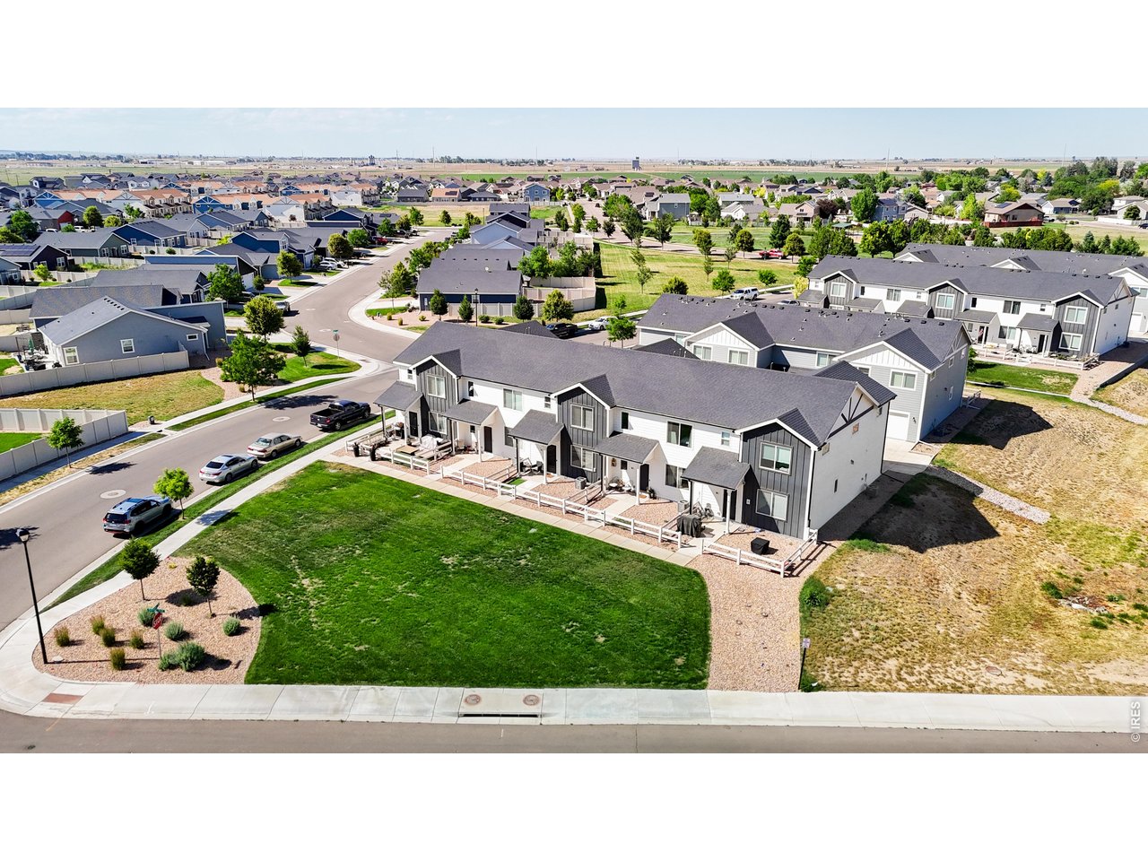 260 Pawnee Road, Unit D3 Ault, CO 80610 - Photo 29 of 44 Front aerial view with green space.