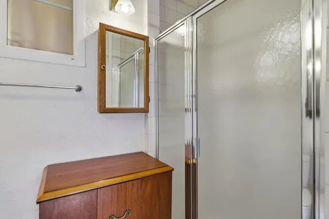 a bathroom with a and a shower