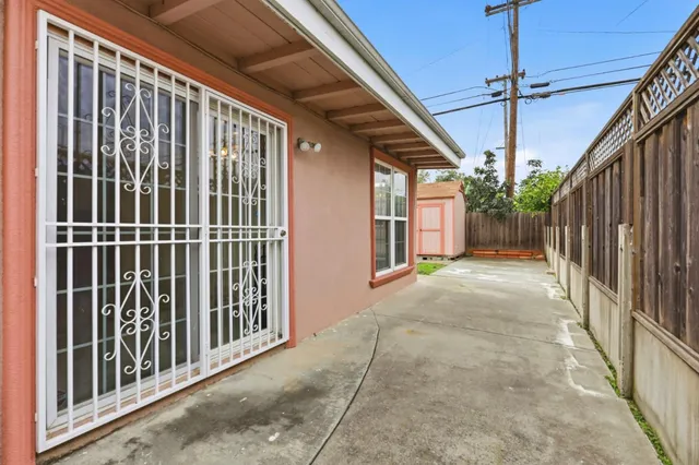 a view of a porch with wooden floor and stairs