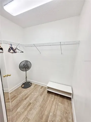 a view of a room with racks on the wall