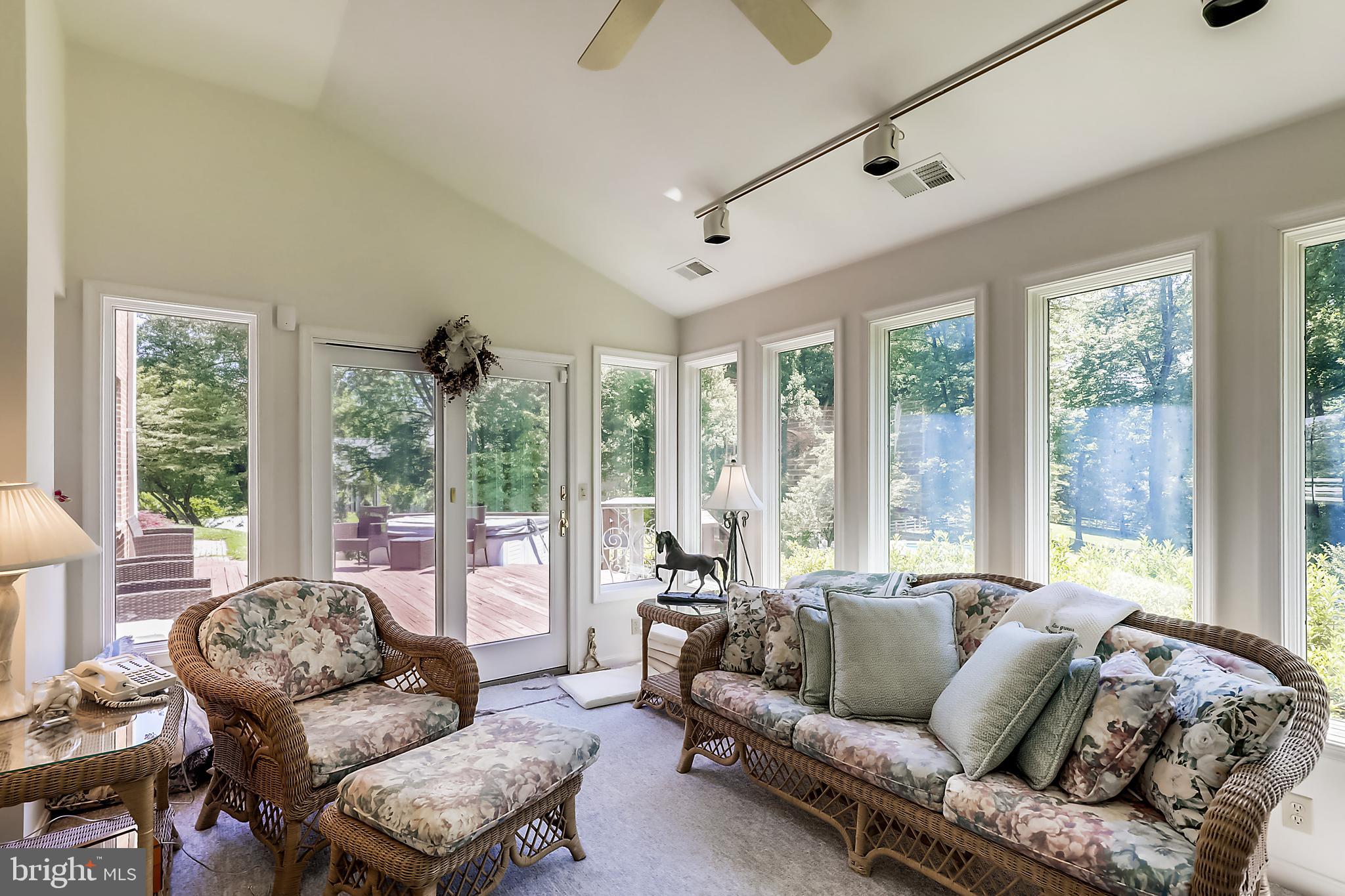 10740 River Road Potomac, MD 20854 - Photo 13 of 64 Entrance from sun room to deck