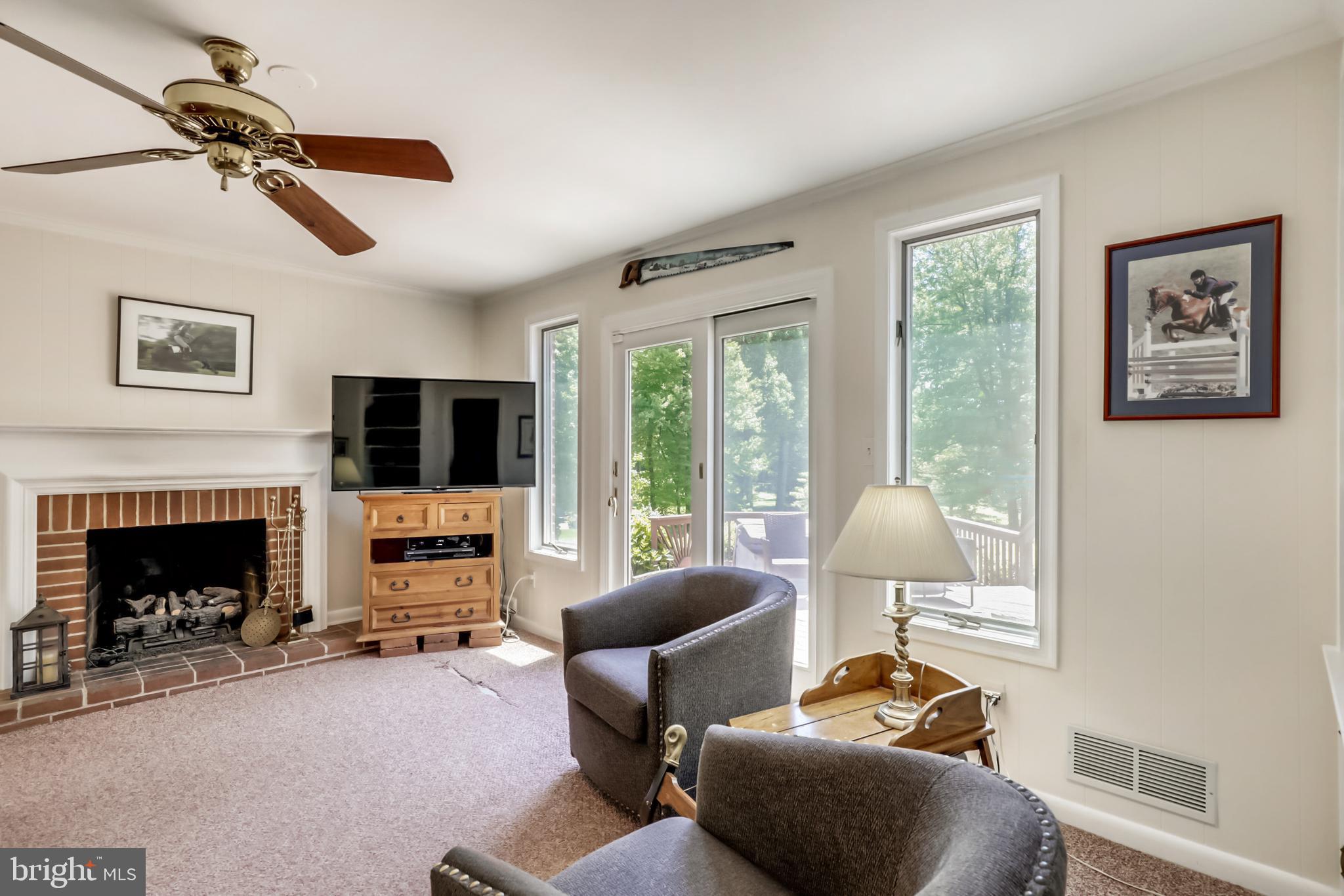 10740 River Road Potomac, MD 20854 - Photo 17 of 64 Family room with gas fireplace