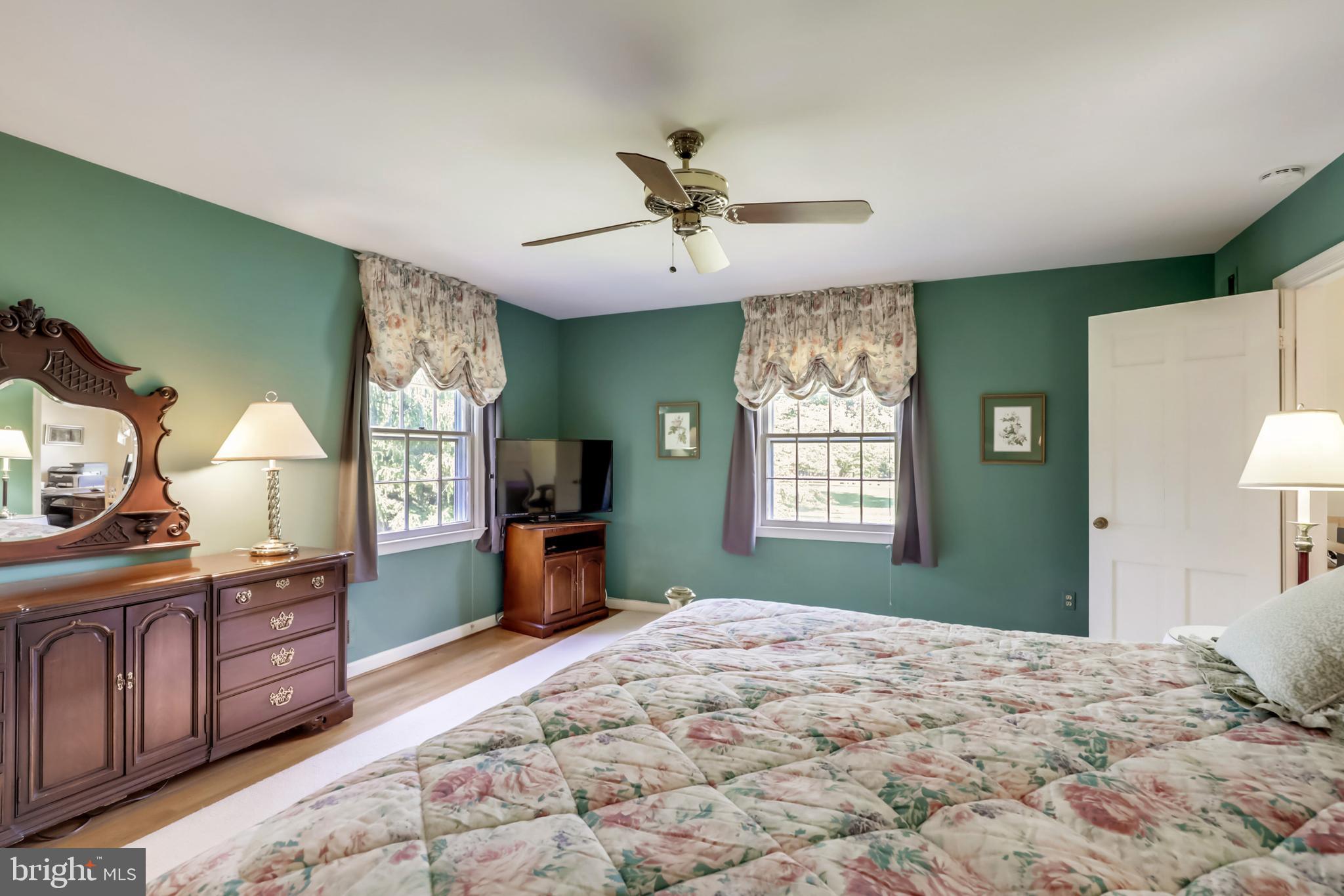 10740 River Road Potomac, MD 20854 - Photo 22 of 64 Master BR w/three windows overlooking front & side