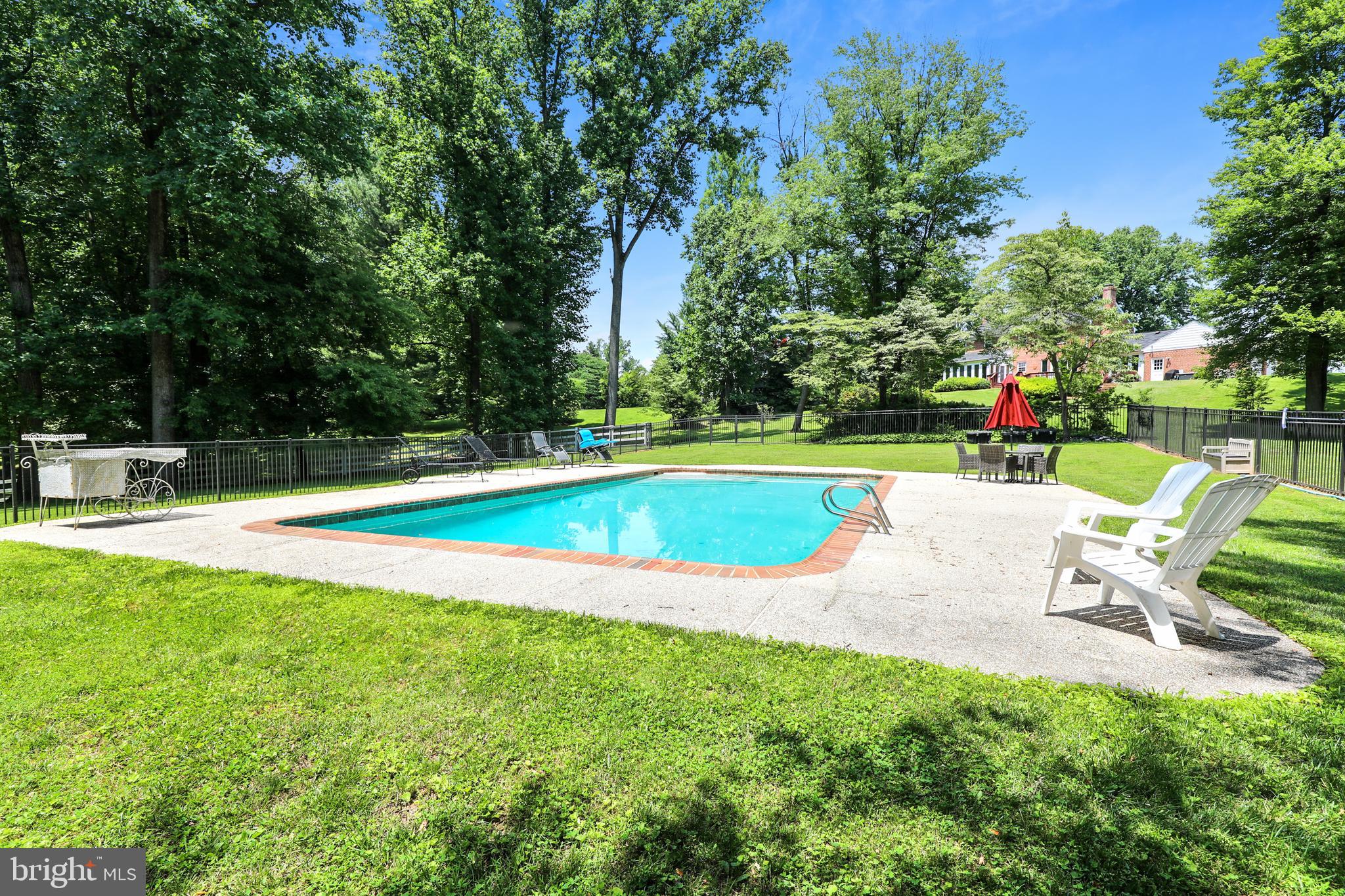 10740 River Road Potomac, MD 20854 - Photo 40 of 64 Imagine lounging by the gorgeous pool