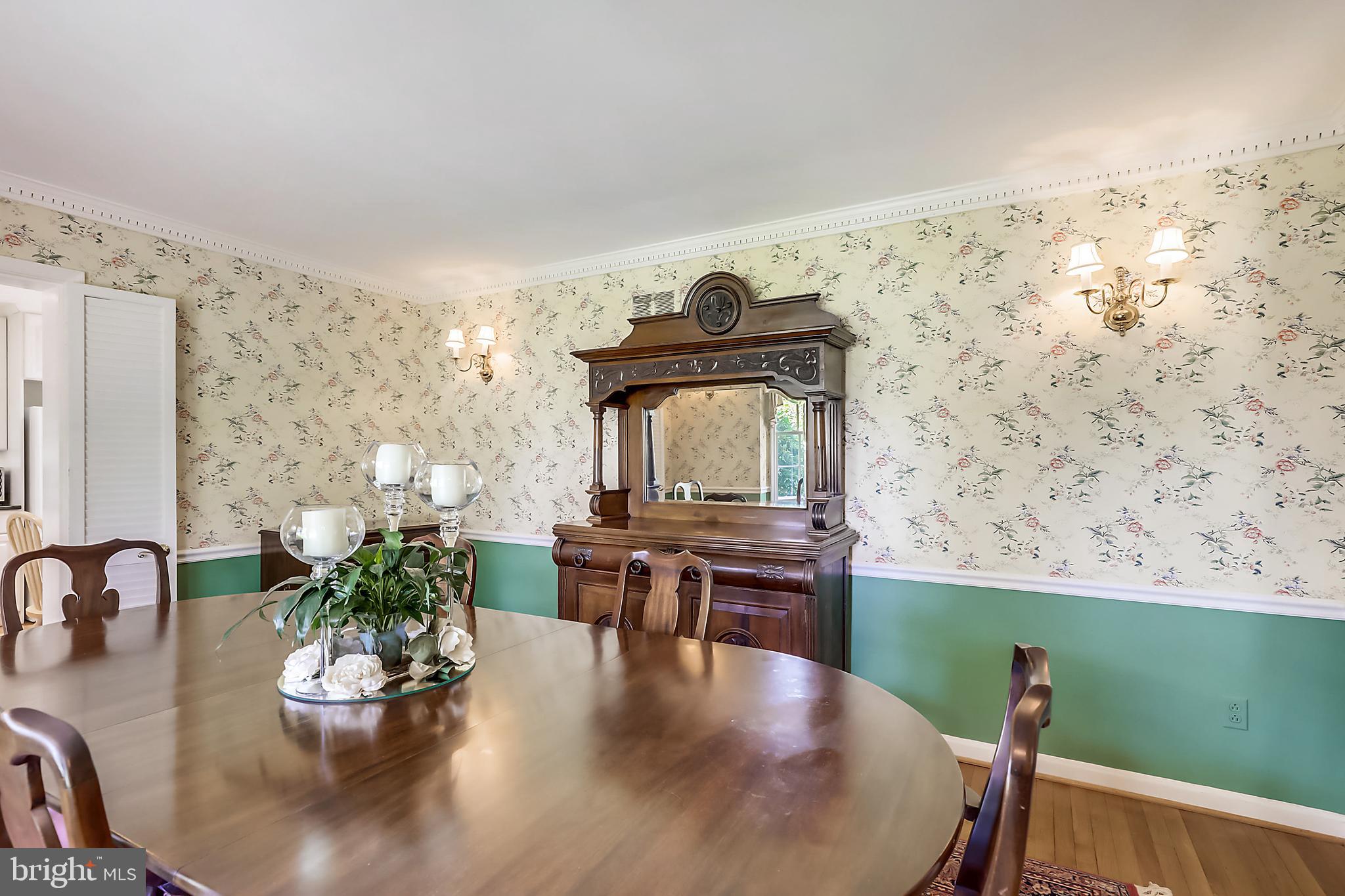 10740 River Road Potomac, MD 20854 - Photo 10 of 64 Dining room with crown molding and chair rail