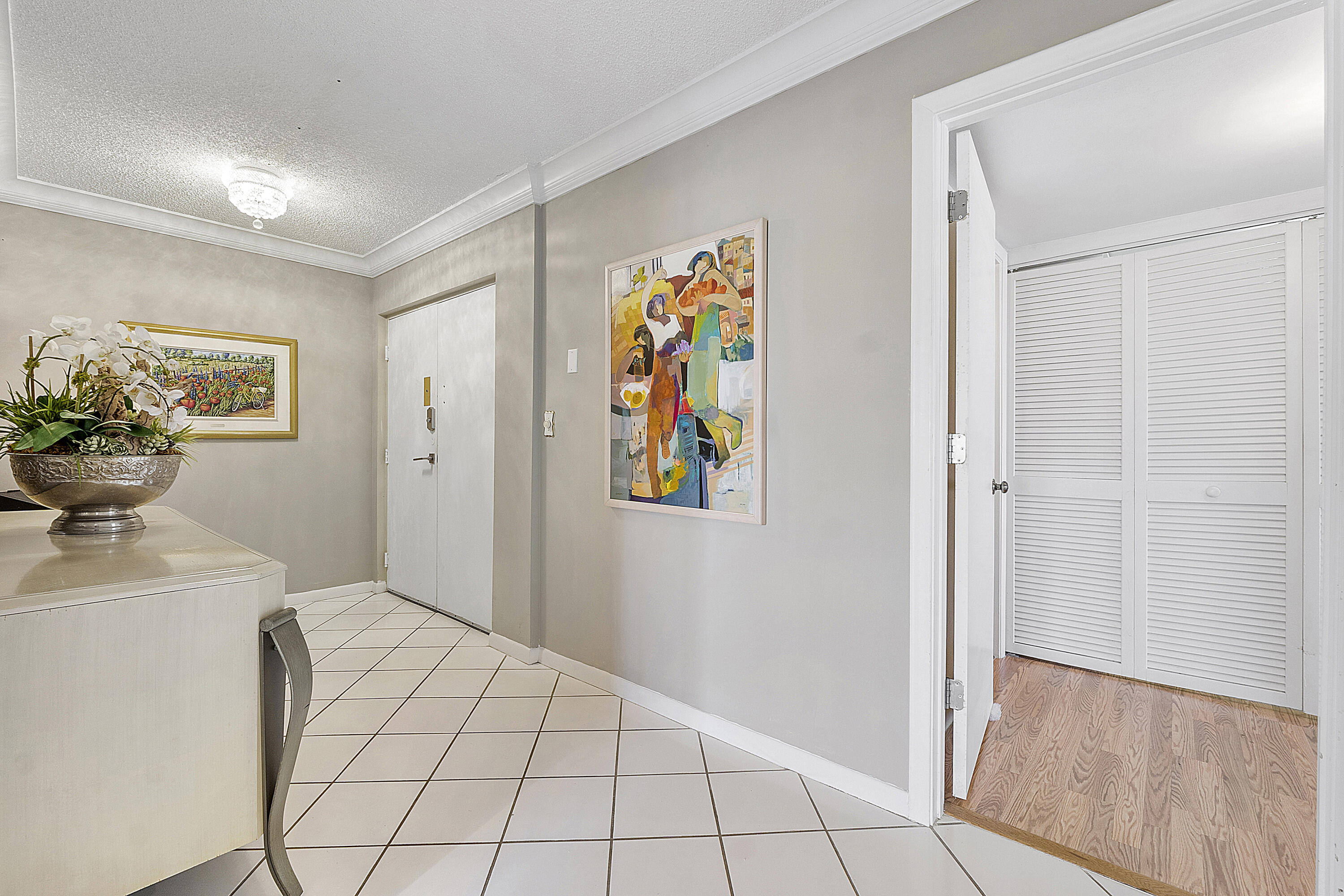 1901 South Ocean Boulevard, Unit 307 Boca Raton, FL 33432 - Photo 18 of 60 Foyer to Primary Suite