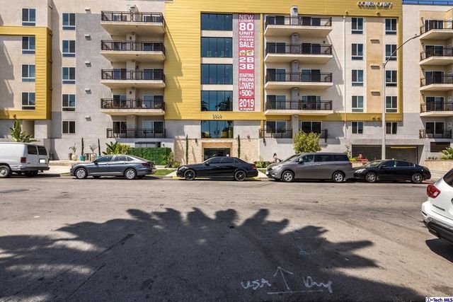 a car parked in front of a building