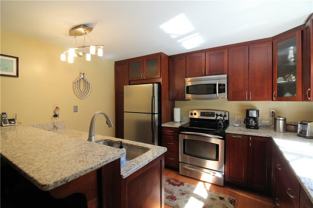 115 Mast Road Westbrook, ME 04092 - Photo 6 of 24 Renovated kitchen with ample cabinet...