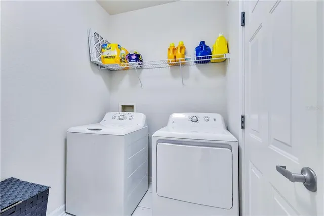 a view of a balcony with chairs