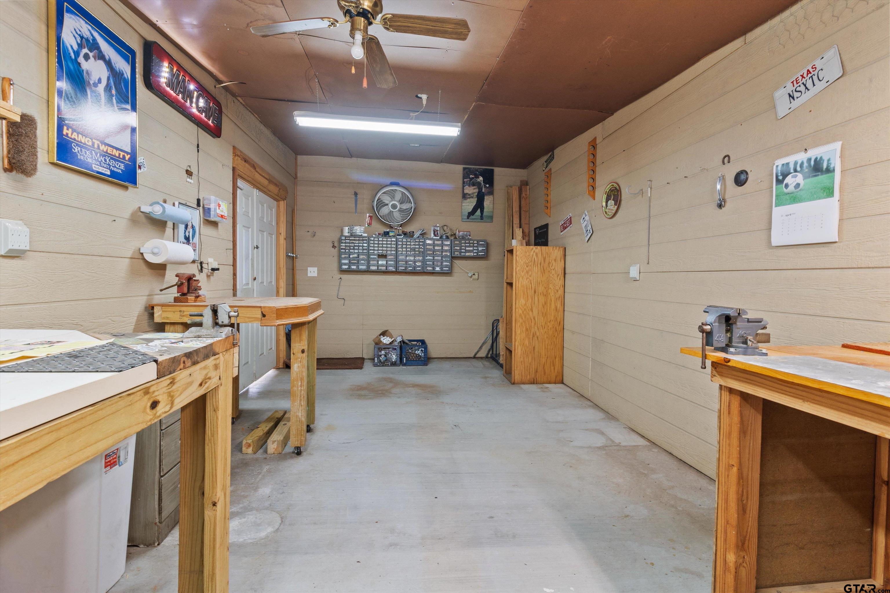 129 Private Road 5569 Alba, TX 75410 - Photo 35 of 40 a view of a storage & utility room with racks on the wall
