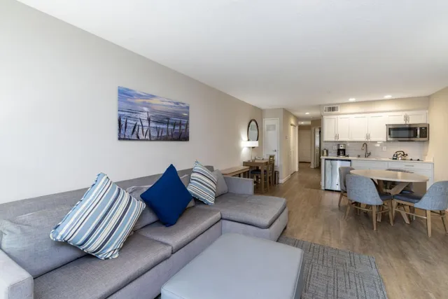 a view of a balcony with a table and chairs