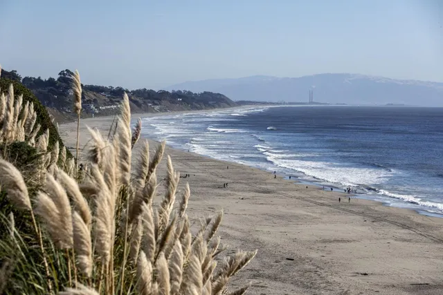 a view of a lake in middle of the town