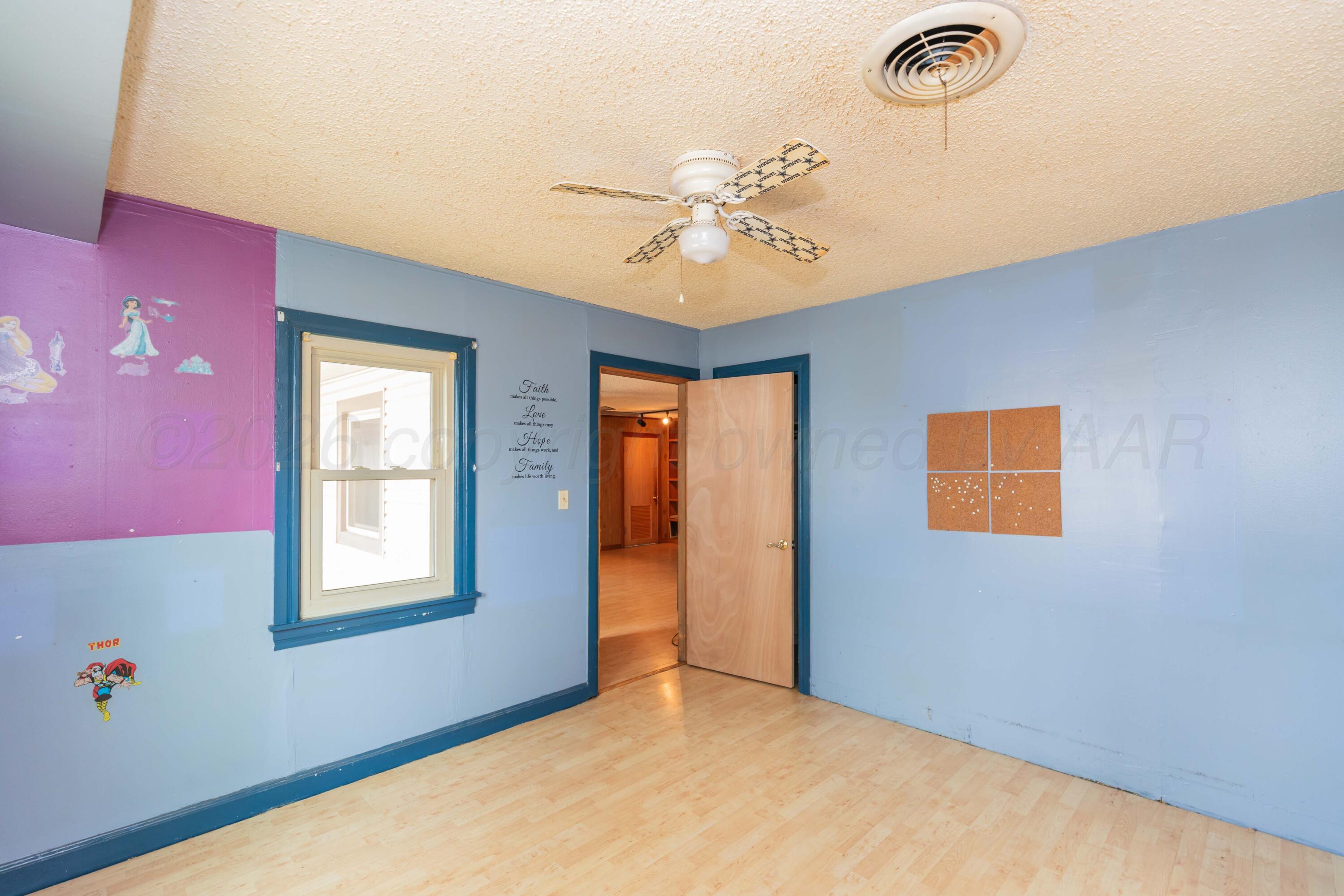 200 South Wall Street Shamrock, TX 79079 - Photo 20 of 40 a view of an empty room with a window