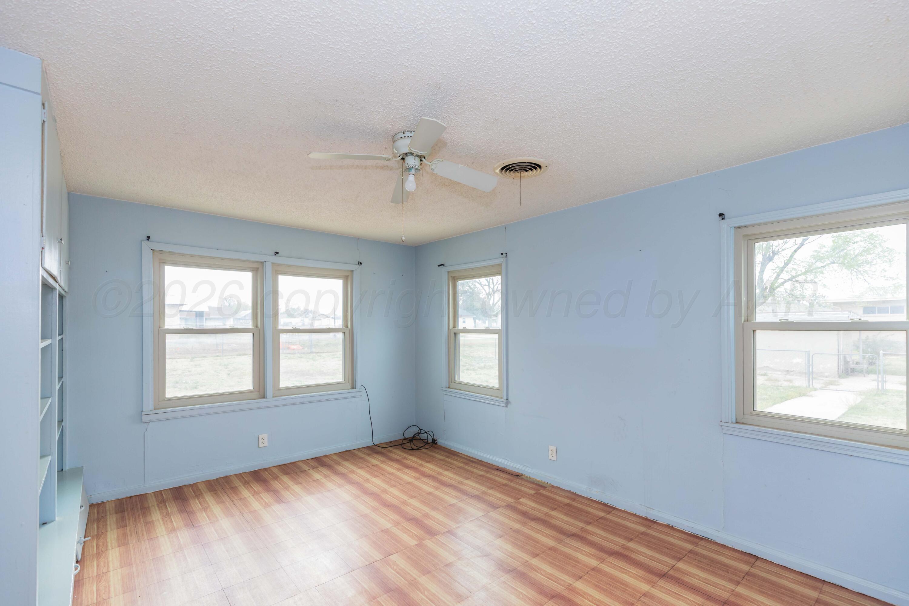200 South Wall Street Shamrock, TX 79079 - Photo 28 of 40 a view of an empty room with a window