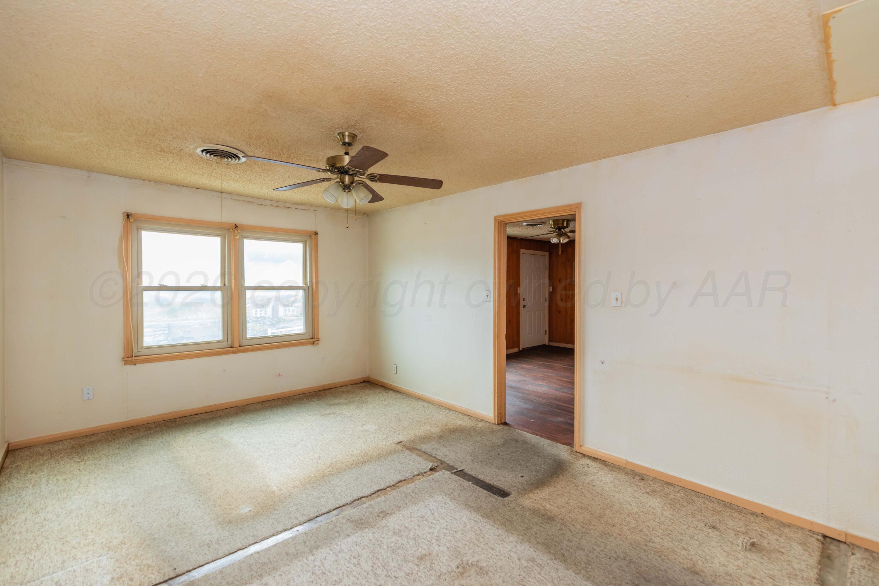 200 South Wall Street Shamrock, TX 79079 - Photo 33 of 40 a view of an empty room with a window