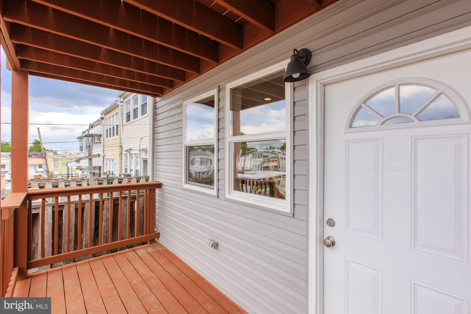 214 Bryant Street Northeast Washington, DC 20002 - Photo 12 of 29 Lower deck leads to parking