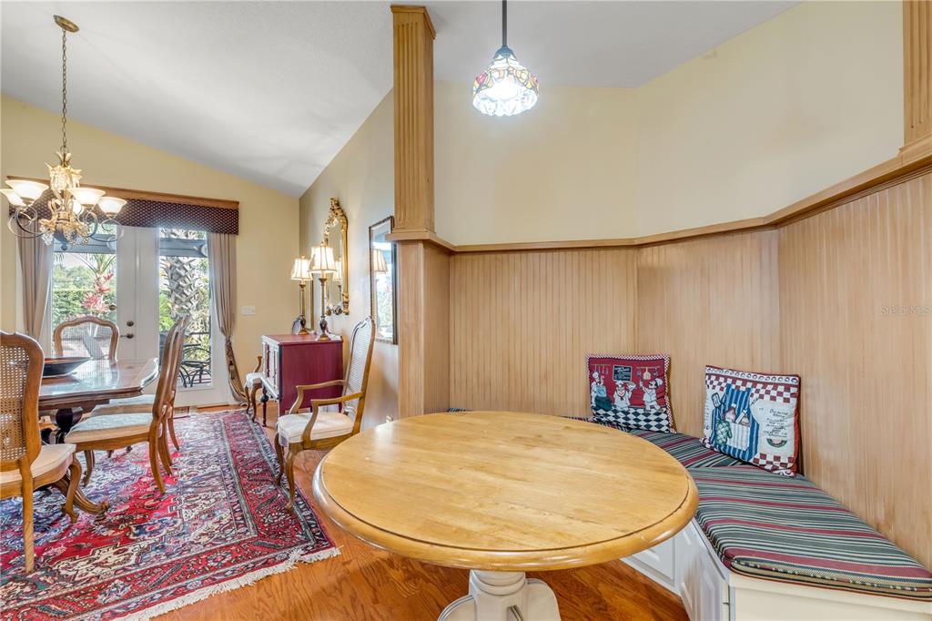 1098 Red Maple Way New Smyrna Beach, FL 32168 - Photo 15 of 78 a view of a dining room with furniture