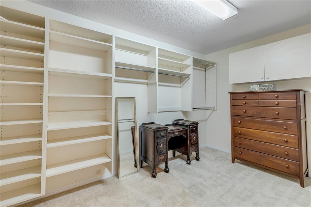 1098 Red Maple Way New Smyrna Beach, FL 32168 - Photo 30 of 78 a view of walk in closet with empty racks