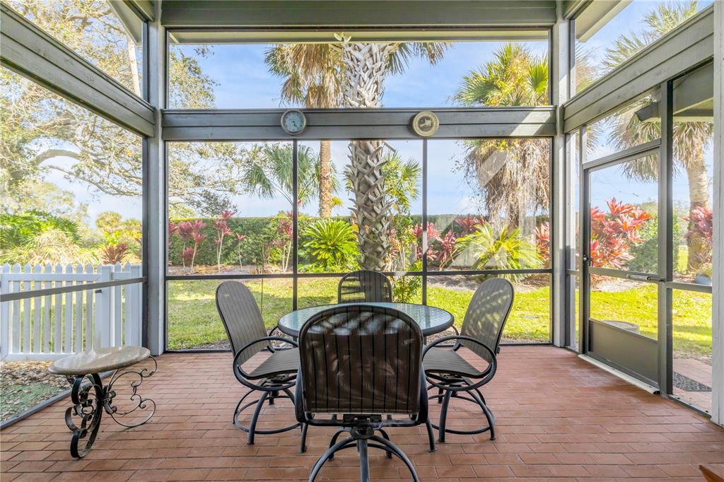 1098 Red Maple Way New Smyrna Beach, FL 32168 - Photo 4 of 78 a view of a dining room with furniture window and wooden floor