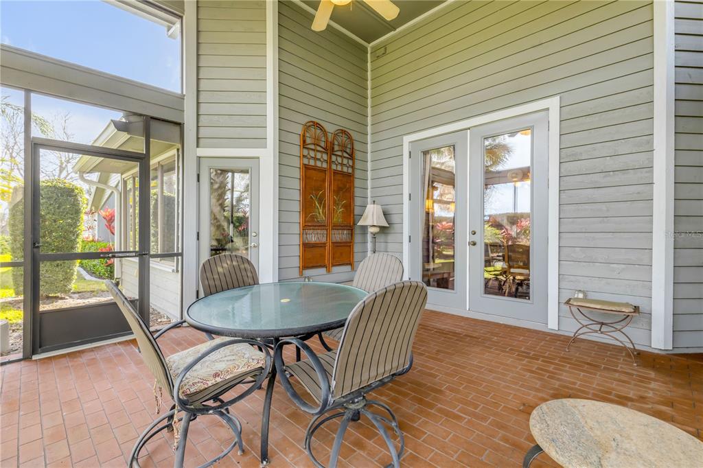 1098 Red Maple Way New Smyrna Beach, FL 32168 - Photo 52 of 78 a living room with furniture and a table