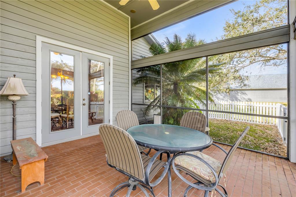 1098 Red Maple Way New Smyrna Beach, FL 32168 - Photo 53 of 78 a view of a dining room with furniture window and wooden floor
