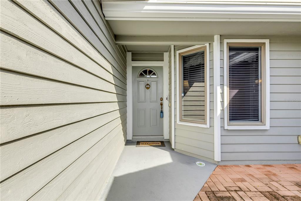 1098 Red Maple Way New Smyrna Beach, FL 32168 - Photo 55 of 78 a view of a house with a door and wooden floor
