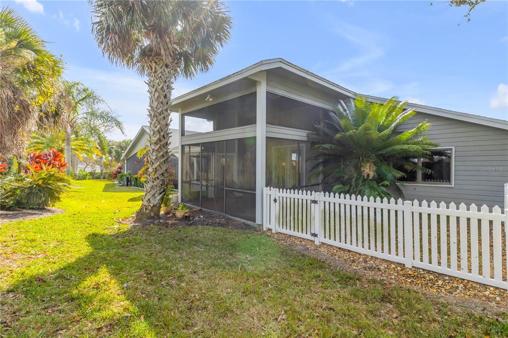 1098 Red Maple Way New Smyrna Beach, FL 32168 - Photo 58 of 78 a view of a house with a yard
