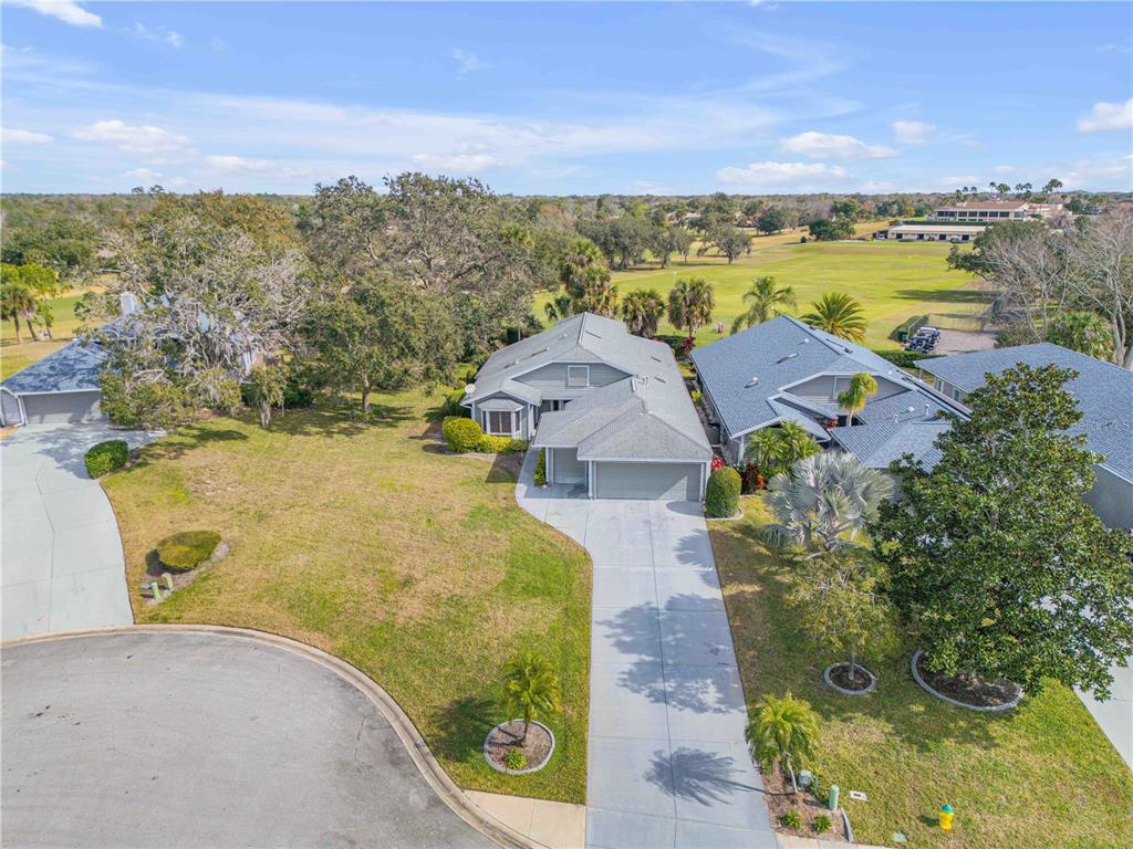 1098 Red Maple Way New Smyrna Beach, FL 32168 - Photo 72 of 78 an aerial view of residential houses with outdoor space