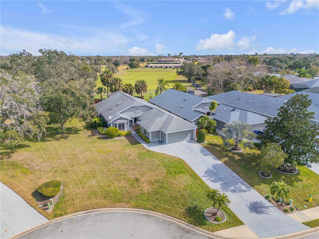 1098 Red Maple Way New Smyrna Beach, FL 32168 - Photo 73 of 78 an aerial view of residential houses with outdoor space and ocean view