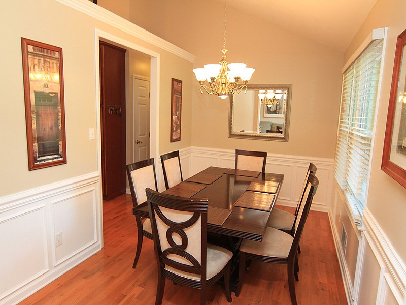 5328 Edington Lane Raleigh, NC 27604 - Photo 6 of 25 Spacious dining room located off the kitchen features crown molding and wainscoting. Dining Room