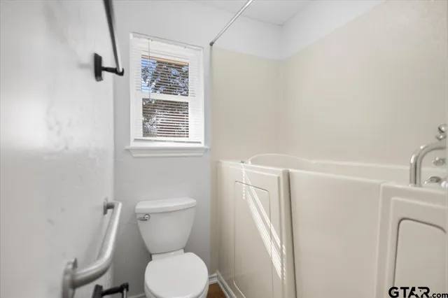 a bathroom with a sink vanity and a mirror