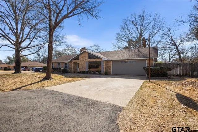 a view of house with outdoor space and street view