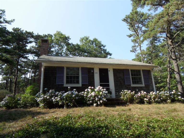 140 Pilgrim Spring Road Wellfleet, MA 02667 - Photo 8 of 23 a view of a house with garden and yard