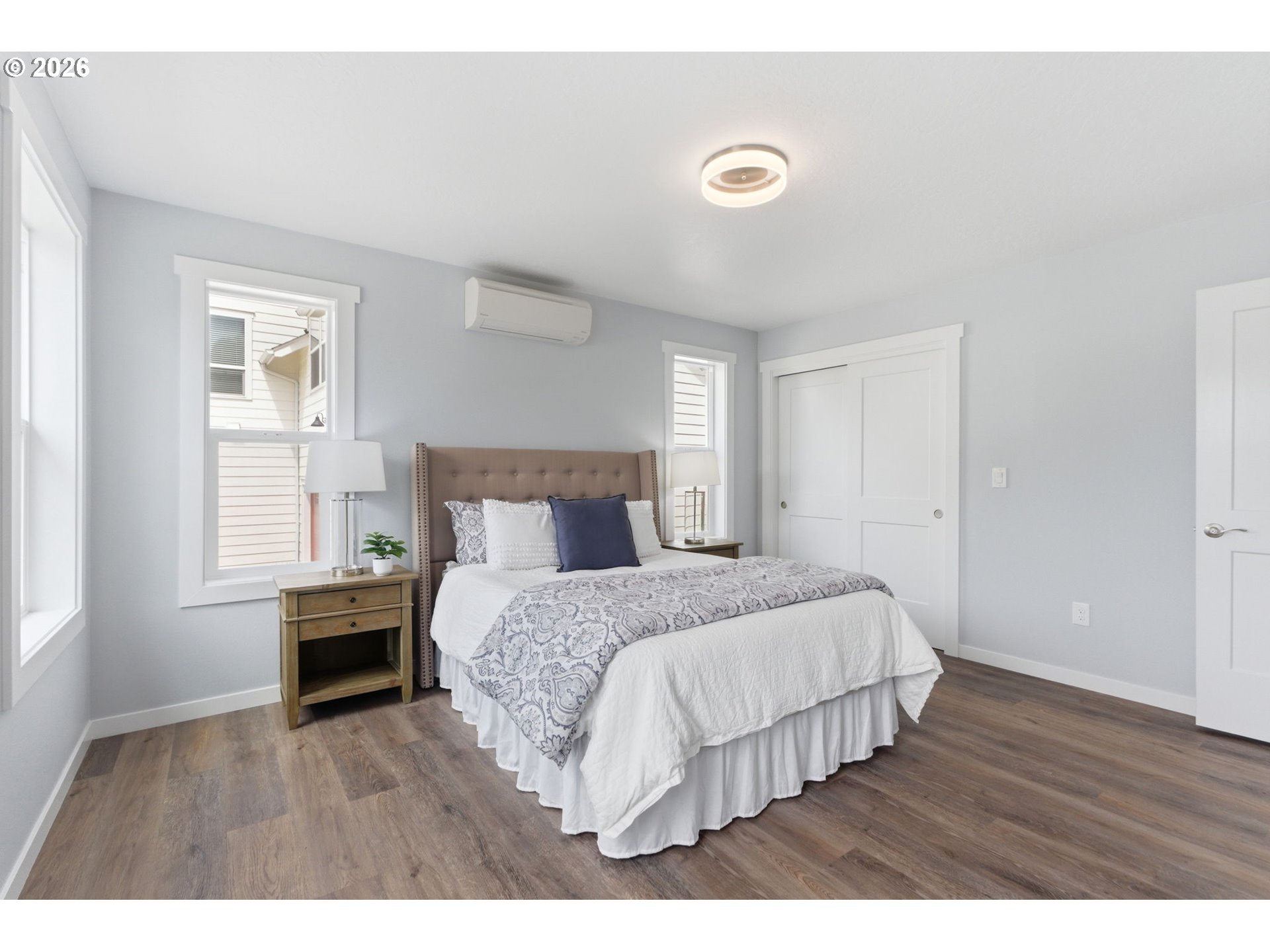 372 Southwest George Court Dundee, OR 97115 - Photo 24 of 33 a bedroom with a bed and wooden floor