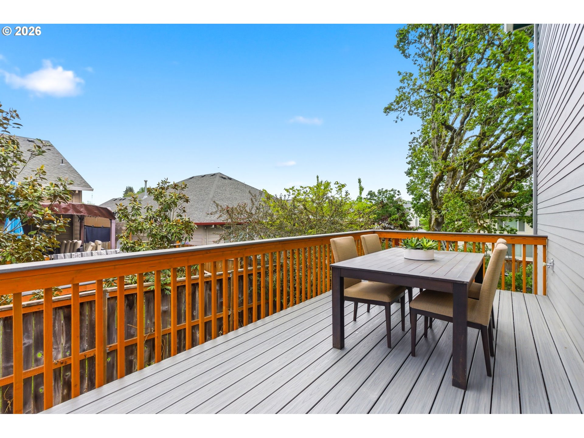372 Southwest George Court Dundee, OR 97115 - Photo 28 of 33 a balcony with wooden floor table and chairs