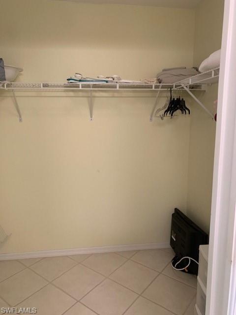 448 Gabriel Circle, Unit 3310 3310 Naples, FL 34104 - Photo 18 of 29 Main bedroom walk in closet.