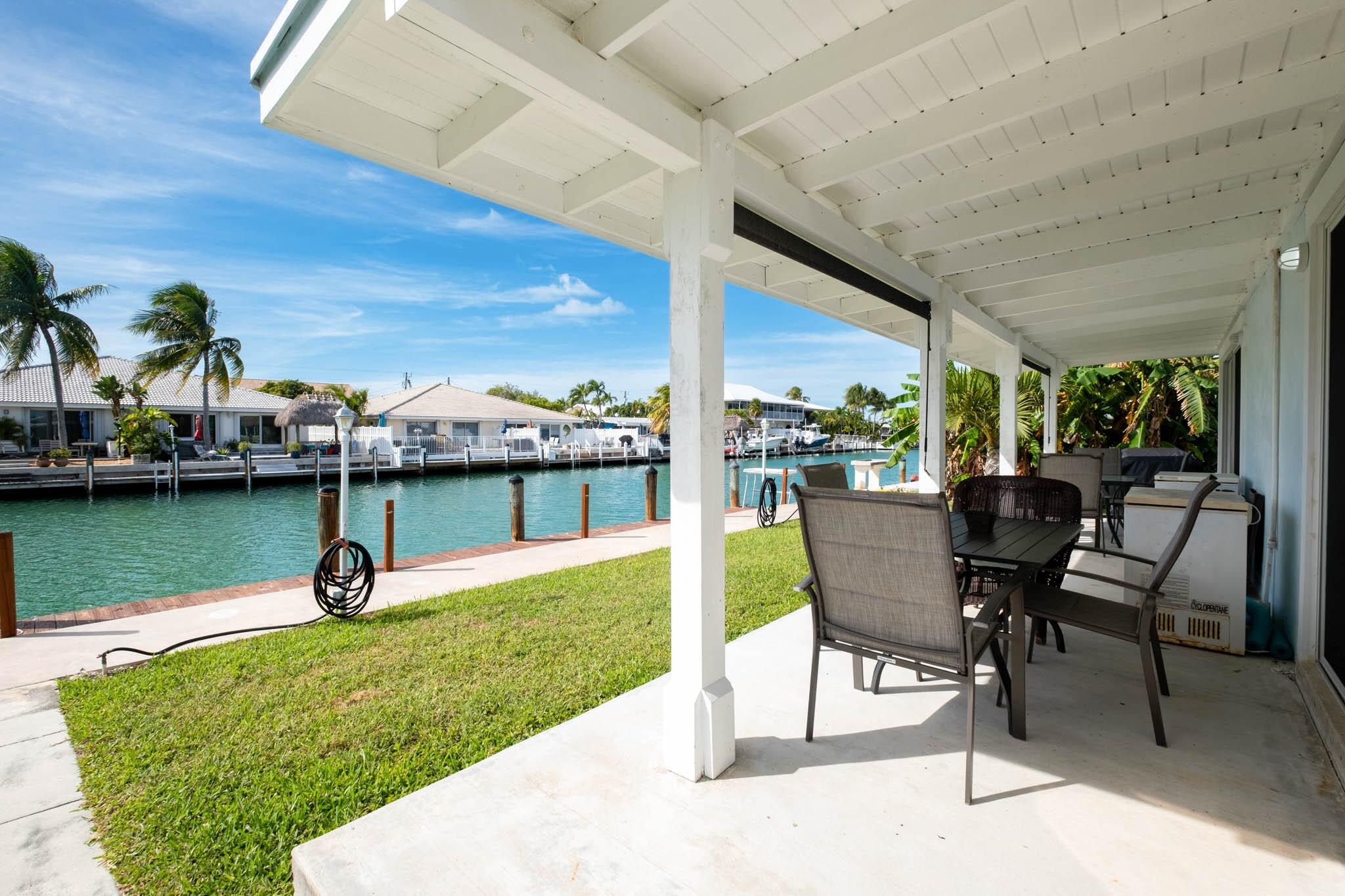 261 9th Street Key Colony Beach, FL 33051 - Photo 14 of 42 261 Patio - Canal North