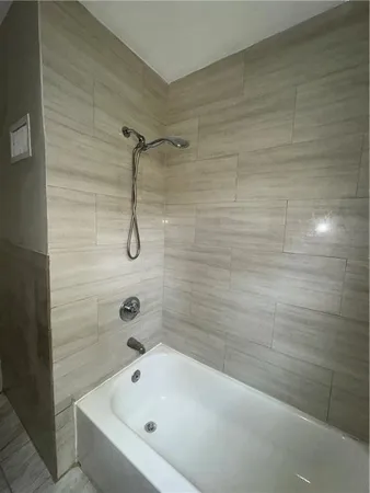 a bathroom with a bathtub