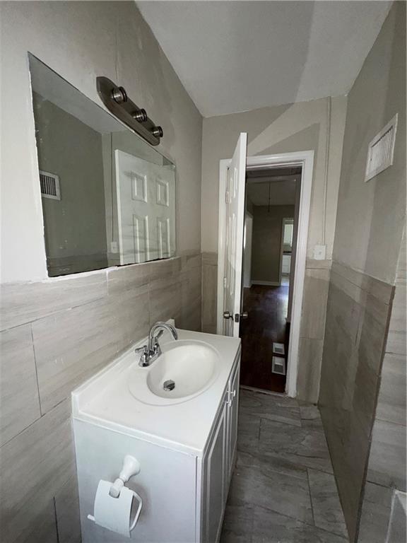 1537 Orlando Street Southwest Atlanta, GA 30311 - Photo 14 of 16 a bathroom with a sink and mirror