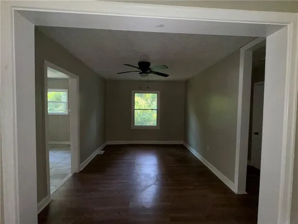 a view of an empty room and window