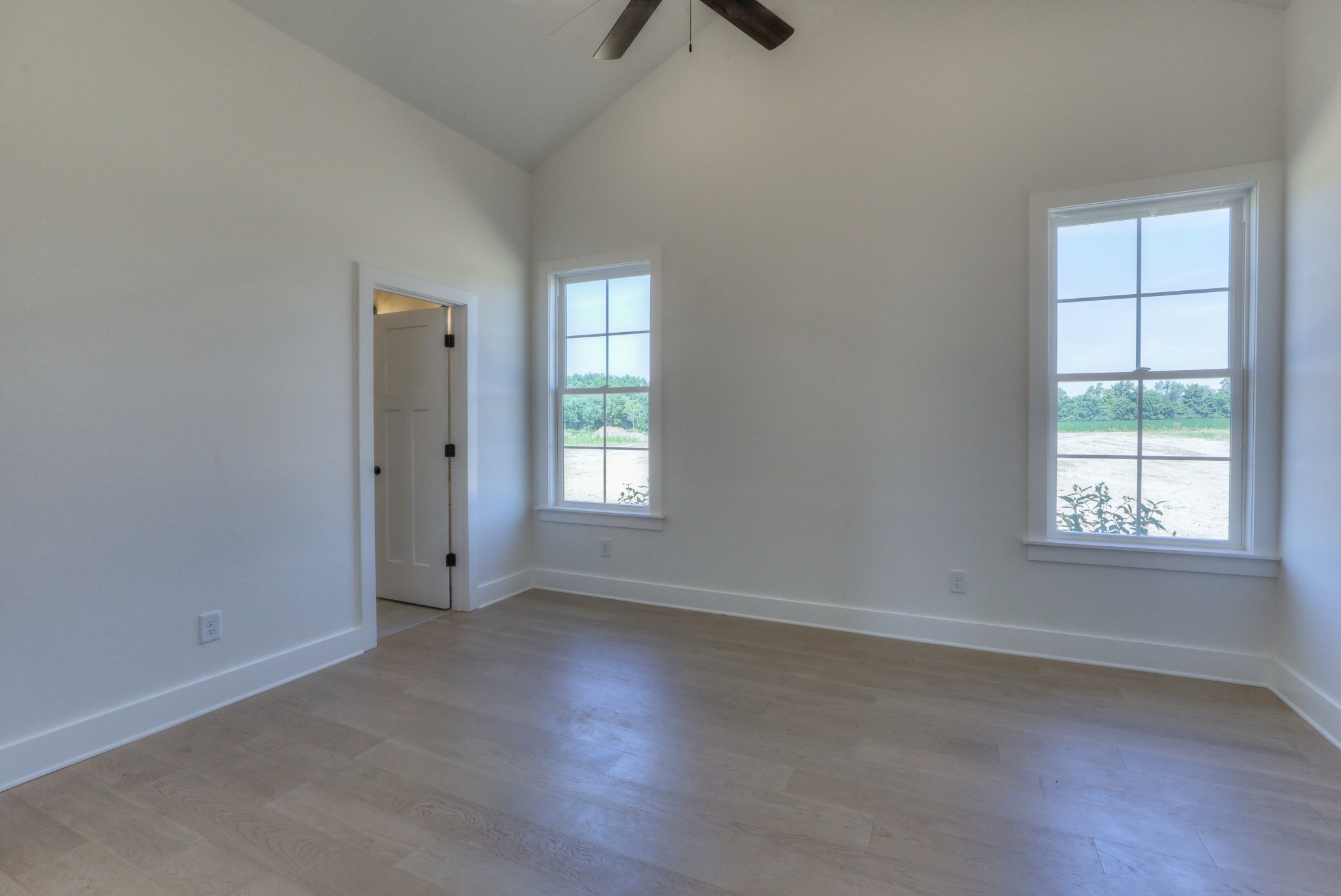 1221 Norton Road Manchester, TN 37355 - Photo 11 of 34 an empty room with a window and a kitchen view