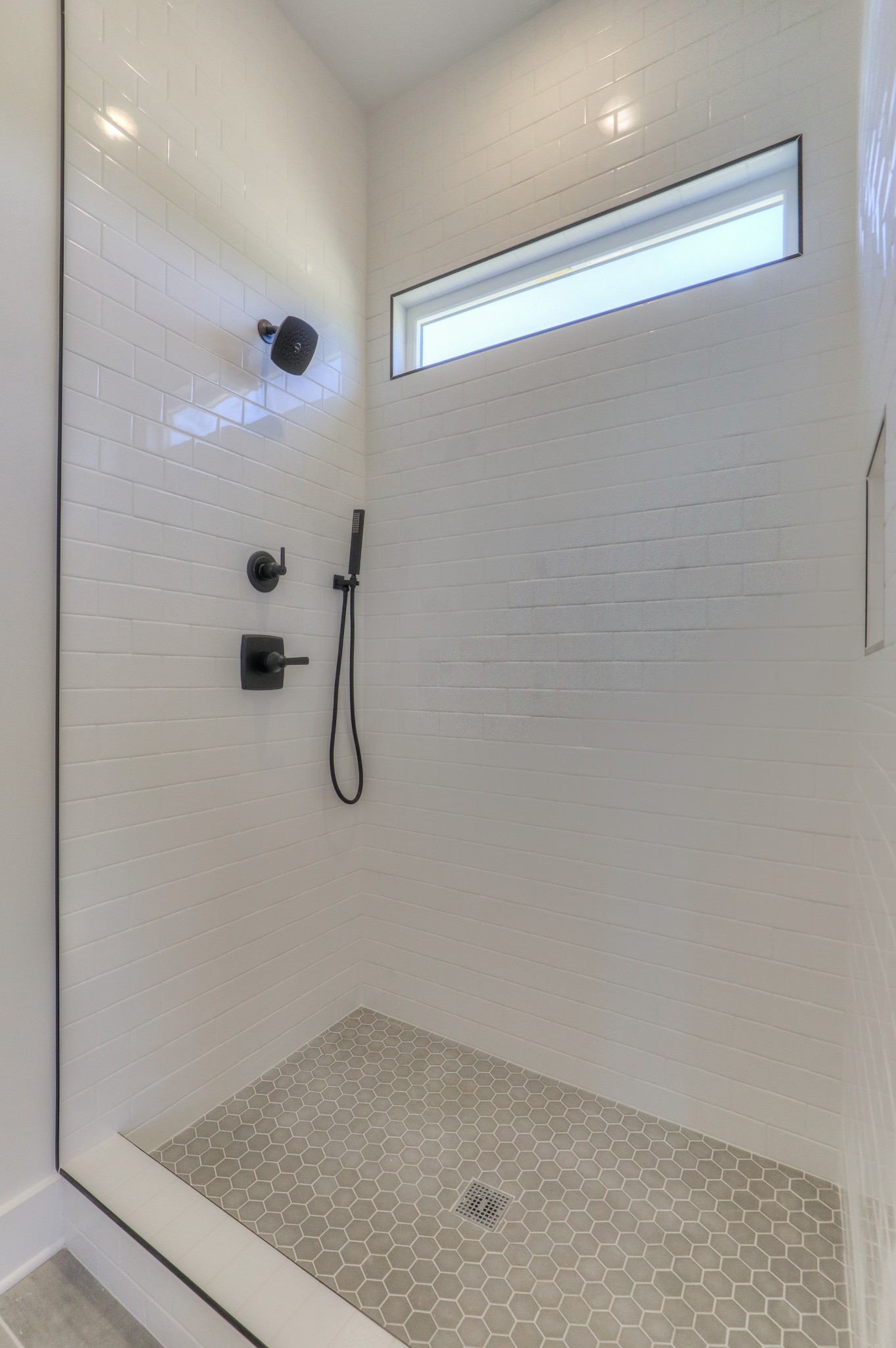 1221 Norton Road Manchester, TN 37355 - Photo 14 of 34 a bathroom with a glass shower door