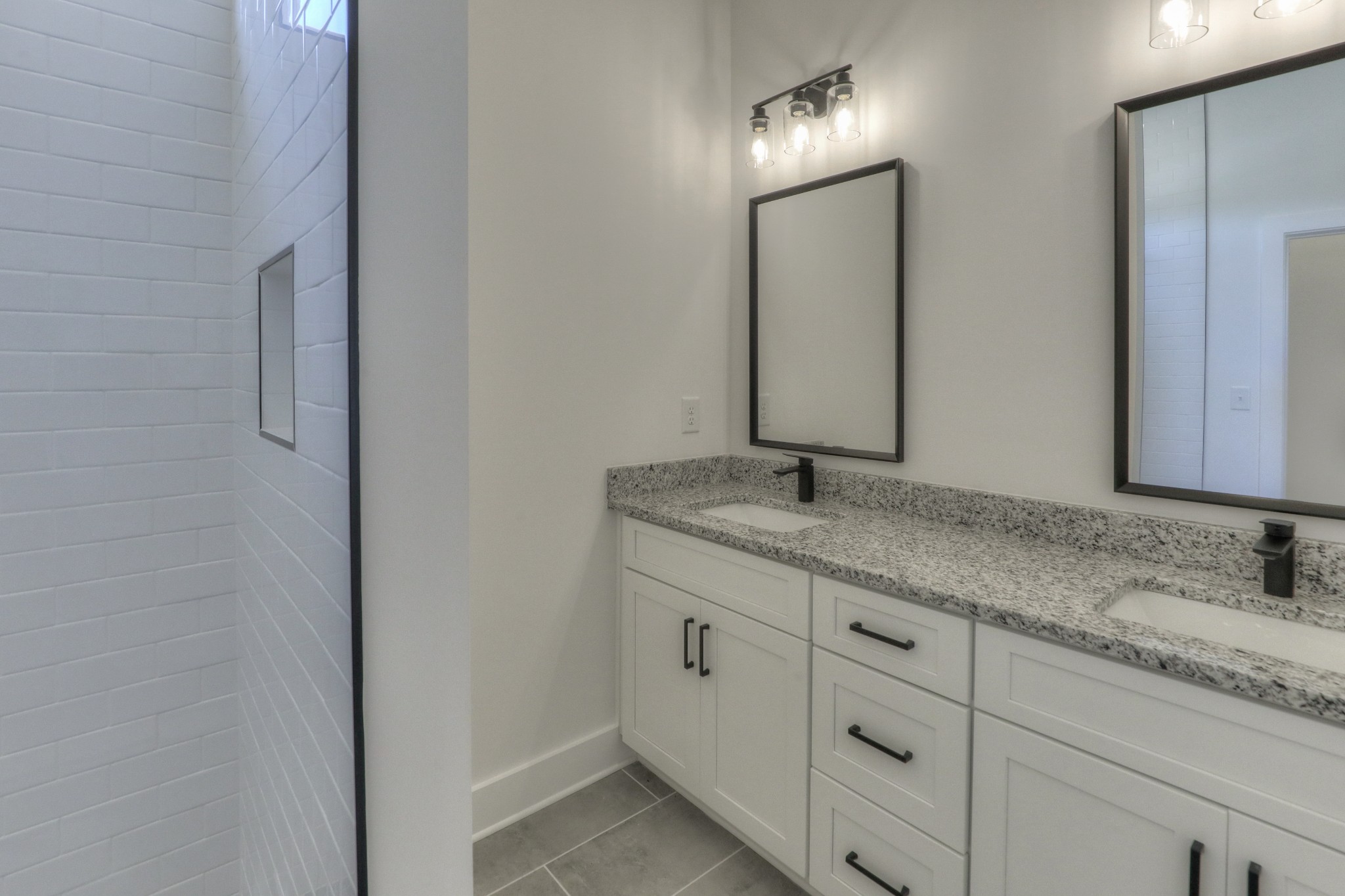 1221 Norton Road Manchester, TN 37355 - Photo 15 of 34 a bathroom with a granite countertop sink and a mirror