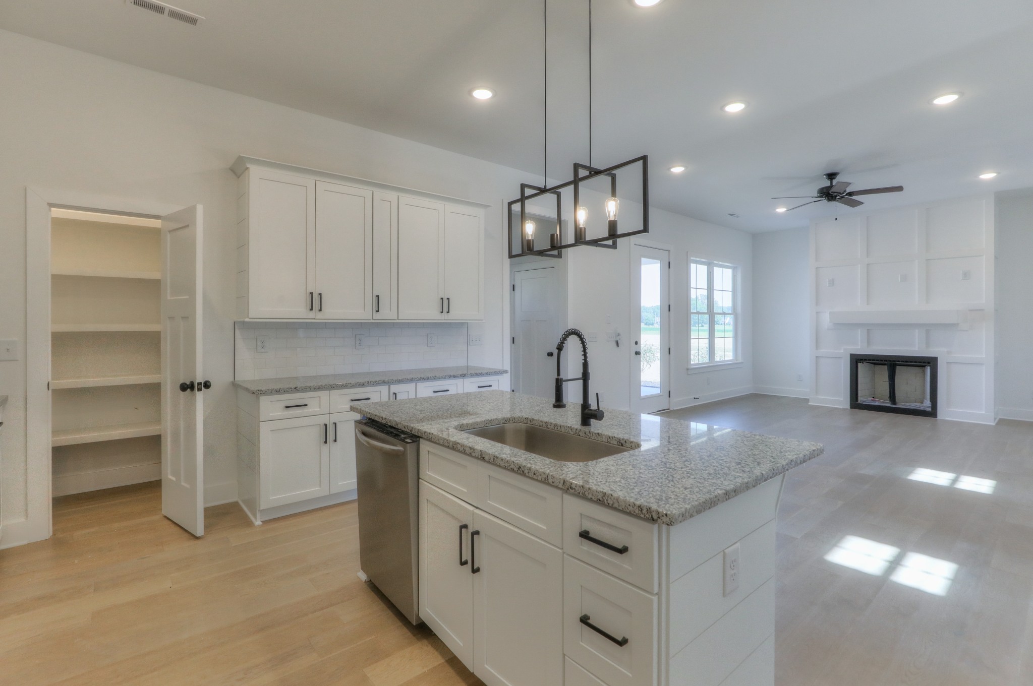 1221 Norton Road Manchester, TN 37355 - Photo 2 of 34 a kitchen with stainless steel appliances granite countertop a sink a stove and a refrigerator