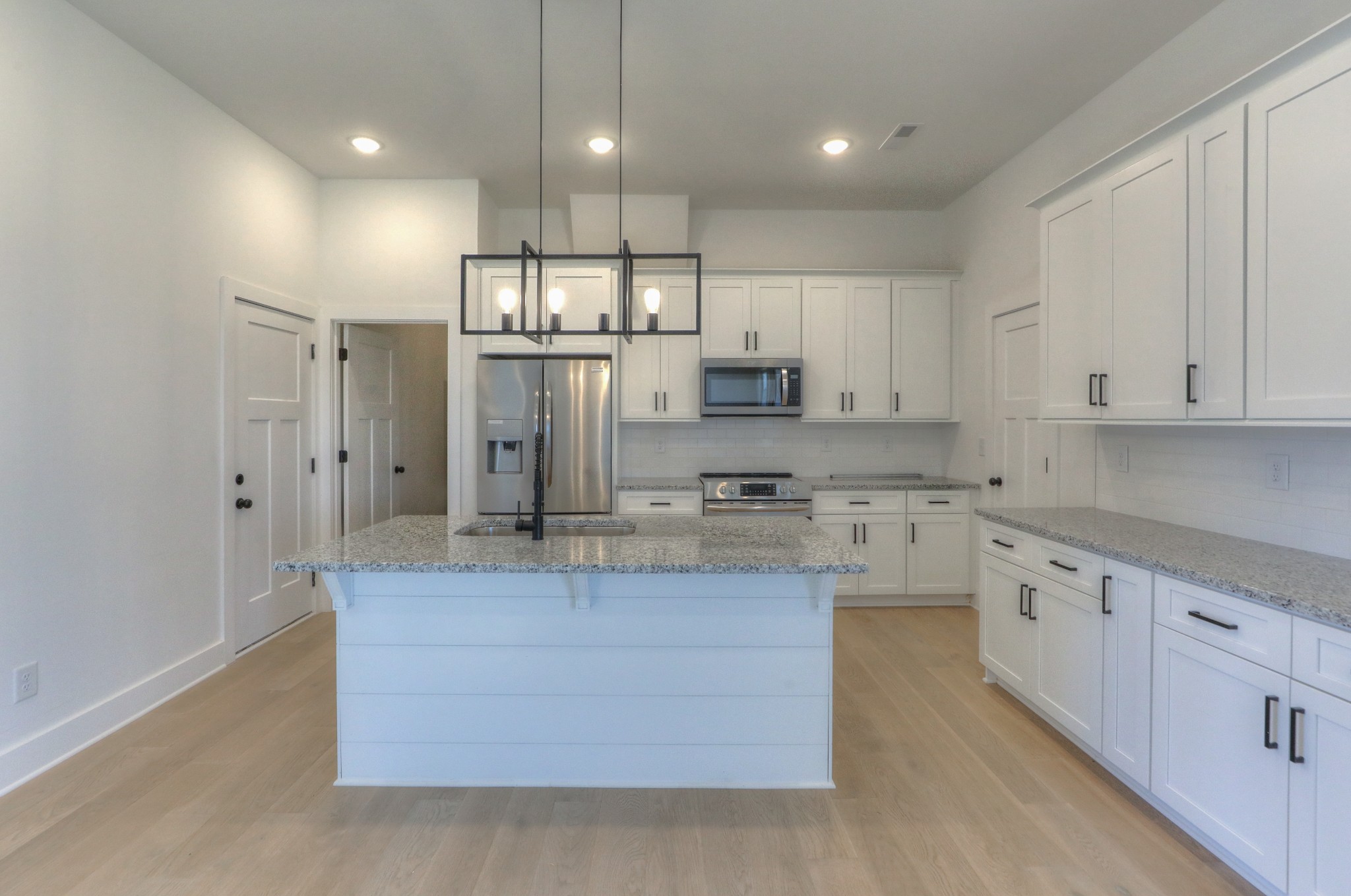 1221 Norton Road Manchester, TN 37355 - Photo 3 of 34 a large kitchen with cabinets