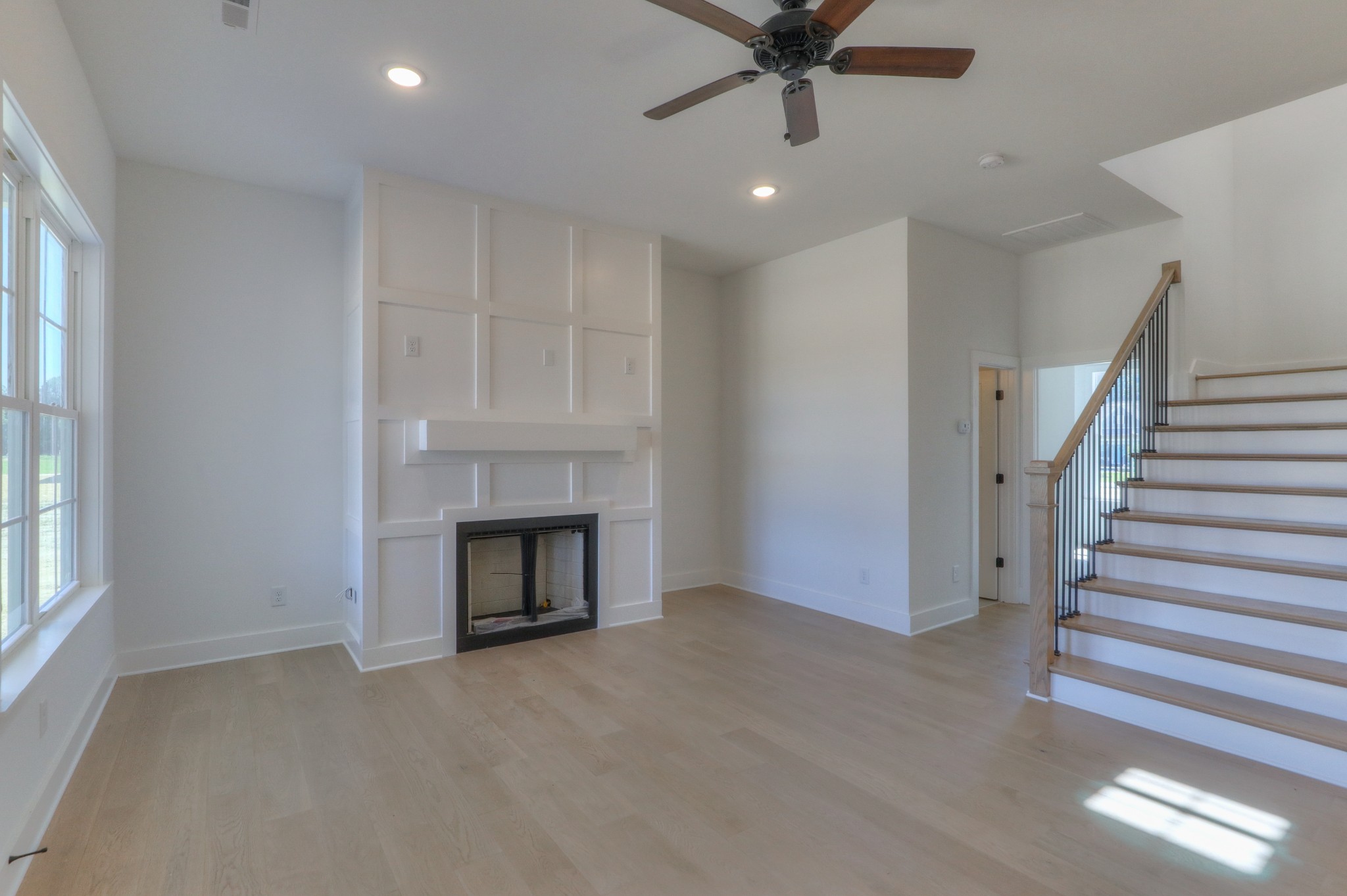 1221 Norton Road Manchester, TN 37355 - Photo 5 of 34 a view of a livingroom with a fireplace and window