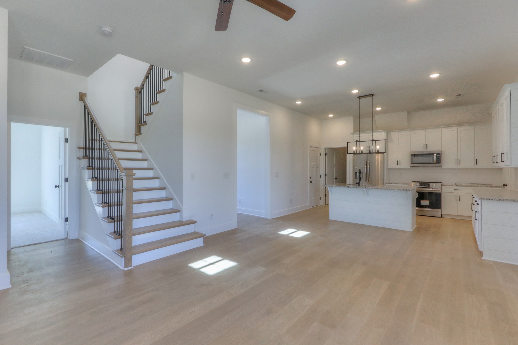 1221 Norton Road Manchester, TN 37355 - Photo 6 of 34 a view of kitchen with furniture and a ceiling fan