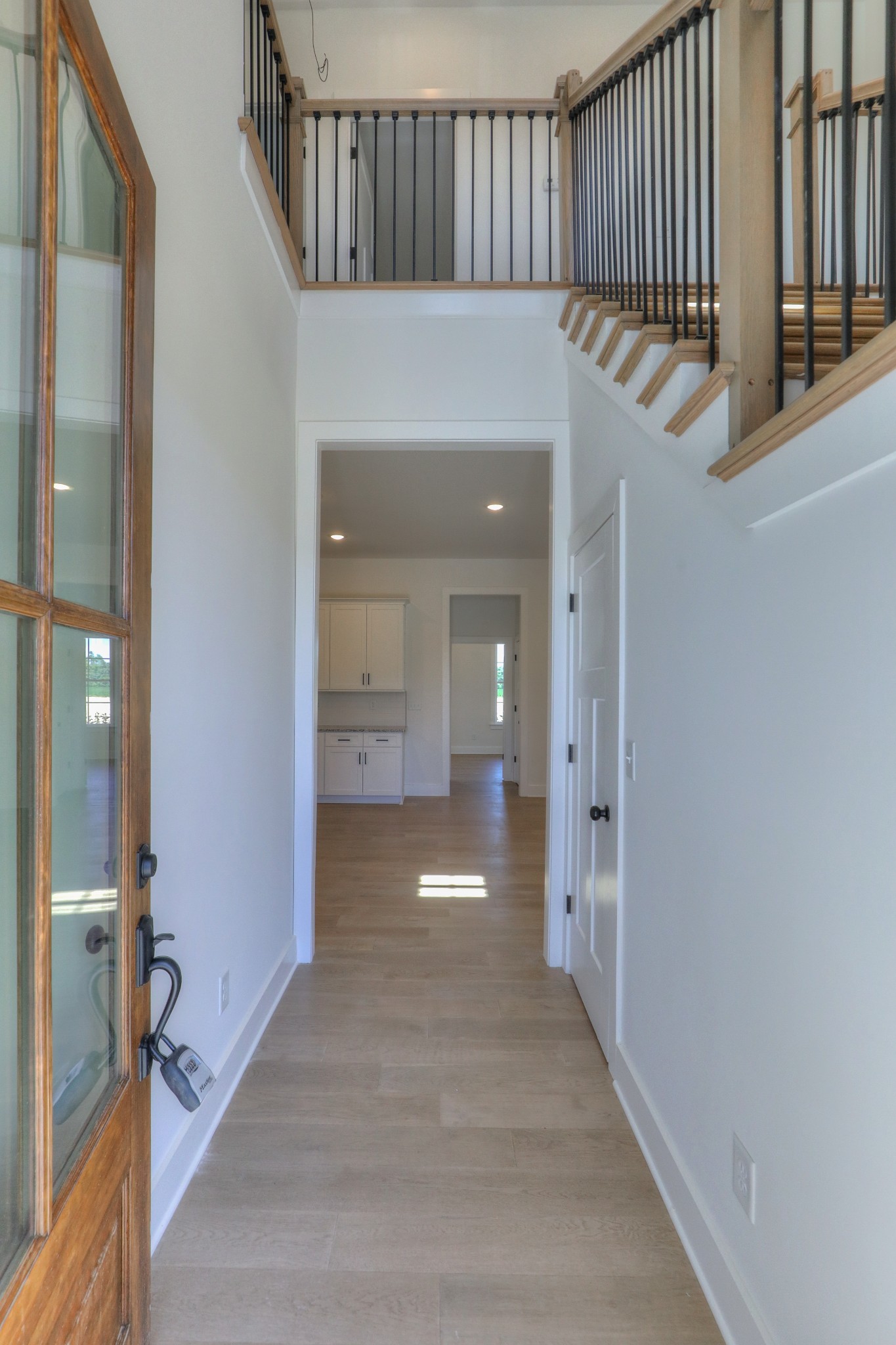 1221 Norton Road Manchester, TN 37355 - Photo 9 of 34 a hallway with wooden floor windows and entryway