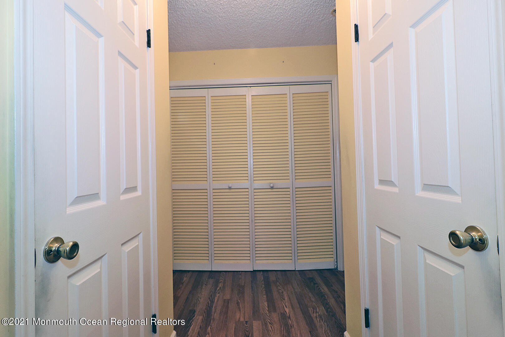 235 Sextant Road Manahawkin, NJ 08050 - Photo 14 of 33 a view of a bathroom with a sink and wooden floor